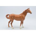 Beswick chestnut swishtail horse 1182. 21.5cm tall. In good condition with no obvious damage