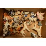 A mixed collection of pottery and similar items to include Beswick Foxhounds (af), Dresden lace lady