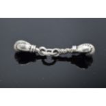 An unusual pair of silver charms in the form of boxing gloves. 19.0 grams.