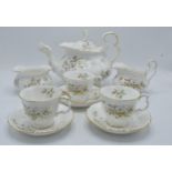 A collection of Royal Albert tea ware in the Haworth design to include a tea pot, 12 cups and