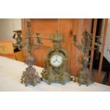 Late 19th / early 20th century gilt brass clock and matching 5 sconce garnitures (3) in a gothic /