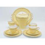 Aynsley coffee set in a yellow and gold design to consist of a coffee pot, milk and sugar pot, 5