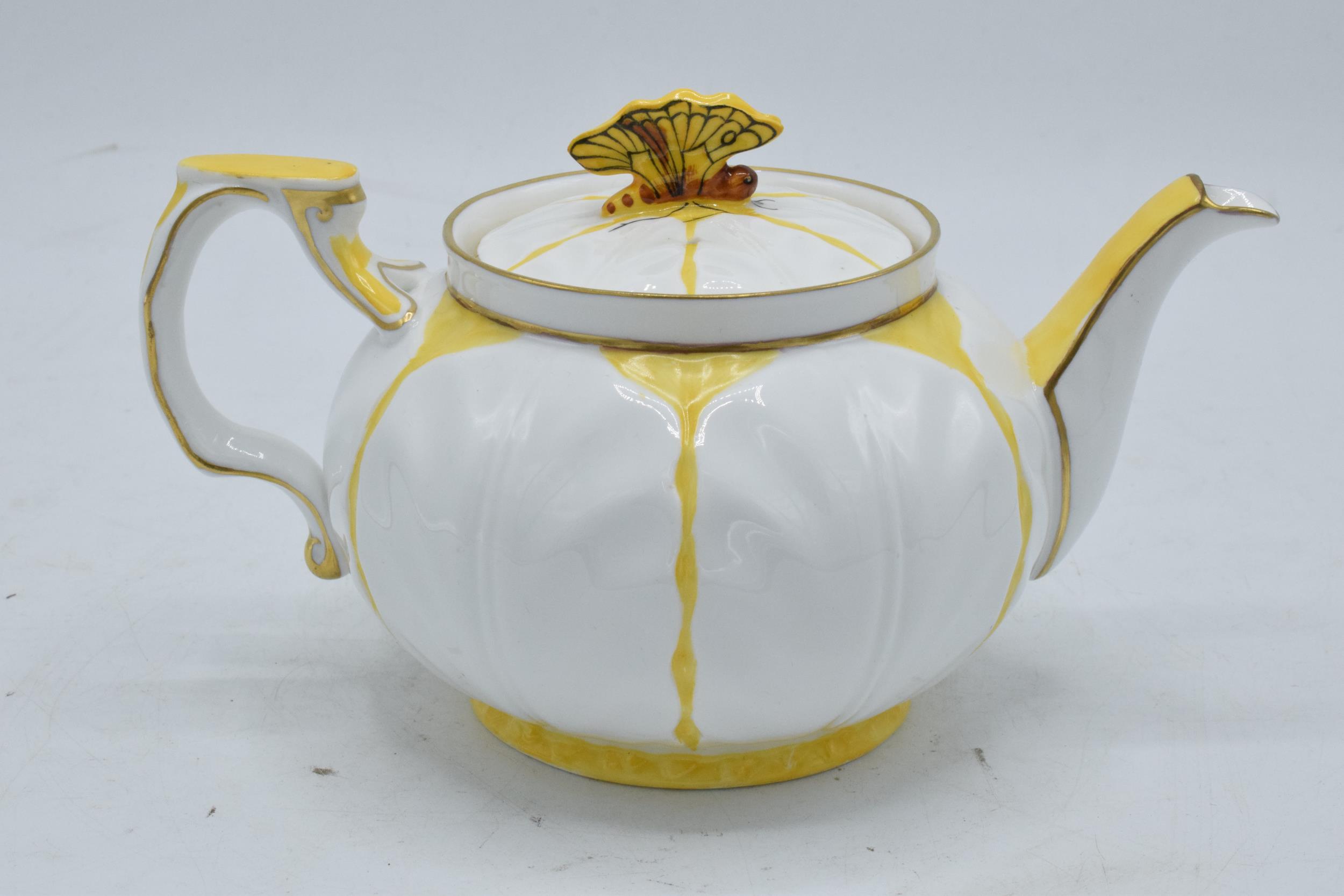 Aynsley yellow leaf moulded teapot with a butterfly finial on the teapot lid. 10cm tall. In good - Image 4 of 8