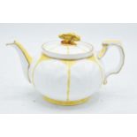 Aynsley yellow leaf moulded teapot with a butterfly finial on the teapot lid. 10cm tall. In good