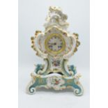 19th Century Jacob Petit porcelain hand painted mantle clock with a porcelain base with an open face