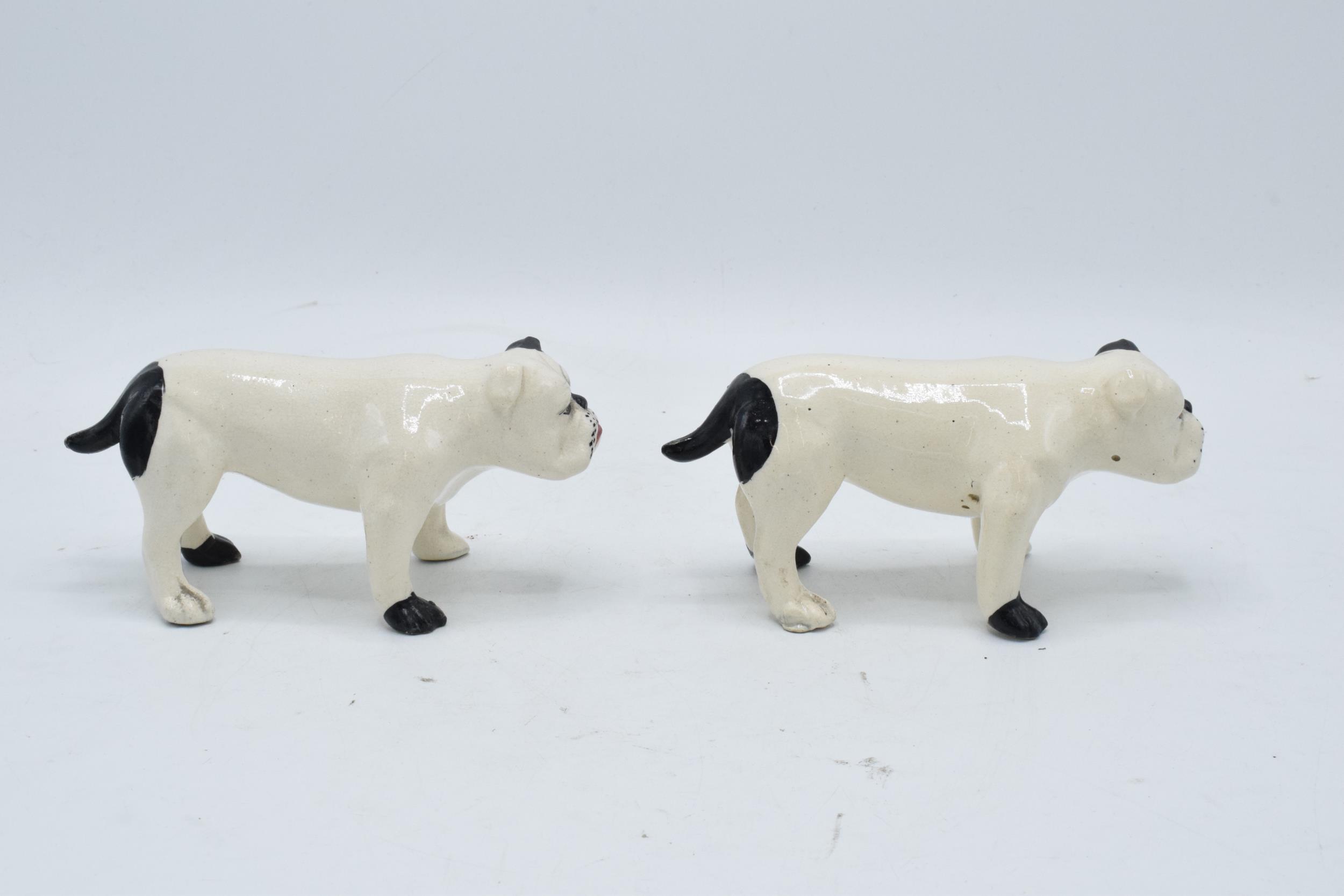 A pair of 19th century pottery bulldogs standing square (2). In good condition with no obvious - Image 3 of 4