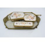 A 20th century brass and gilt metal dressing table set with embroidered decoration to include