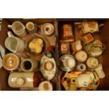 A mixed collection of pottery to include a stoneware foot warmer, stoneware jugs, kitchenalia, Price