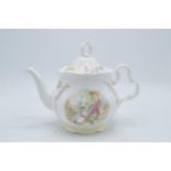 Royal Albert teapot The World of Beatrix Potter. 16cm tall. In good condition with no obvious damage