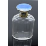 Silver glass scent bottle with a blue enamelled lid. Birmingham 1928. In good condition. Minor