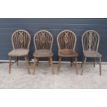 A set of matching farmhouse spindle back chairs x 3 together with a matched example (4). Approx 89cm