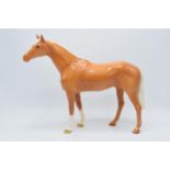 Beswick large palomino racehorse 1564. In good condition with no obvious damage though the back left