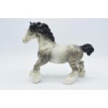 Beswick rocking horse grey cantering shire horse 975. 21cm tall. In good condition with no obvious