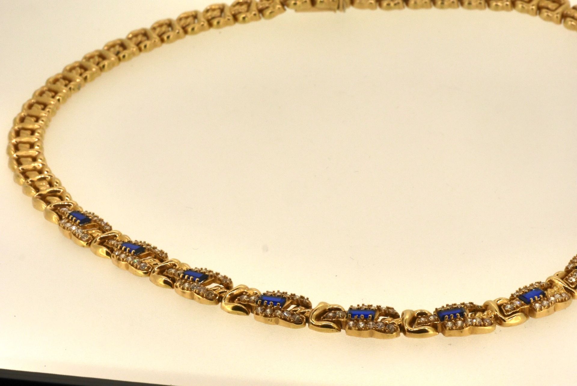 Collier GG 585; Zirkonia, blaue Steine, 42 cm, 29,51 Gramm