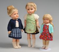 Drei Puppenmädchen