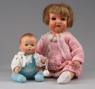 Paar Puppen, u.a. Schildkröt