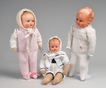 Drei Celluloid-Puppen, u.a. Schildkröt und Cellba