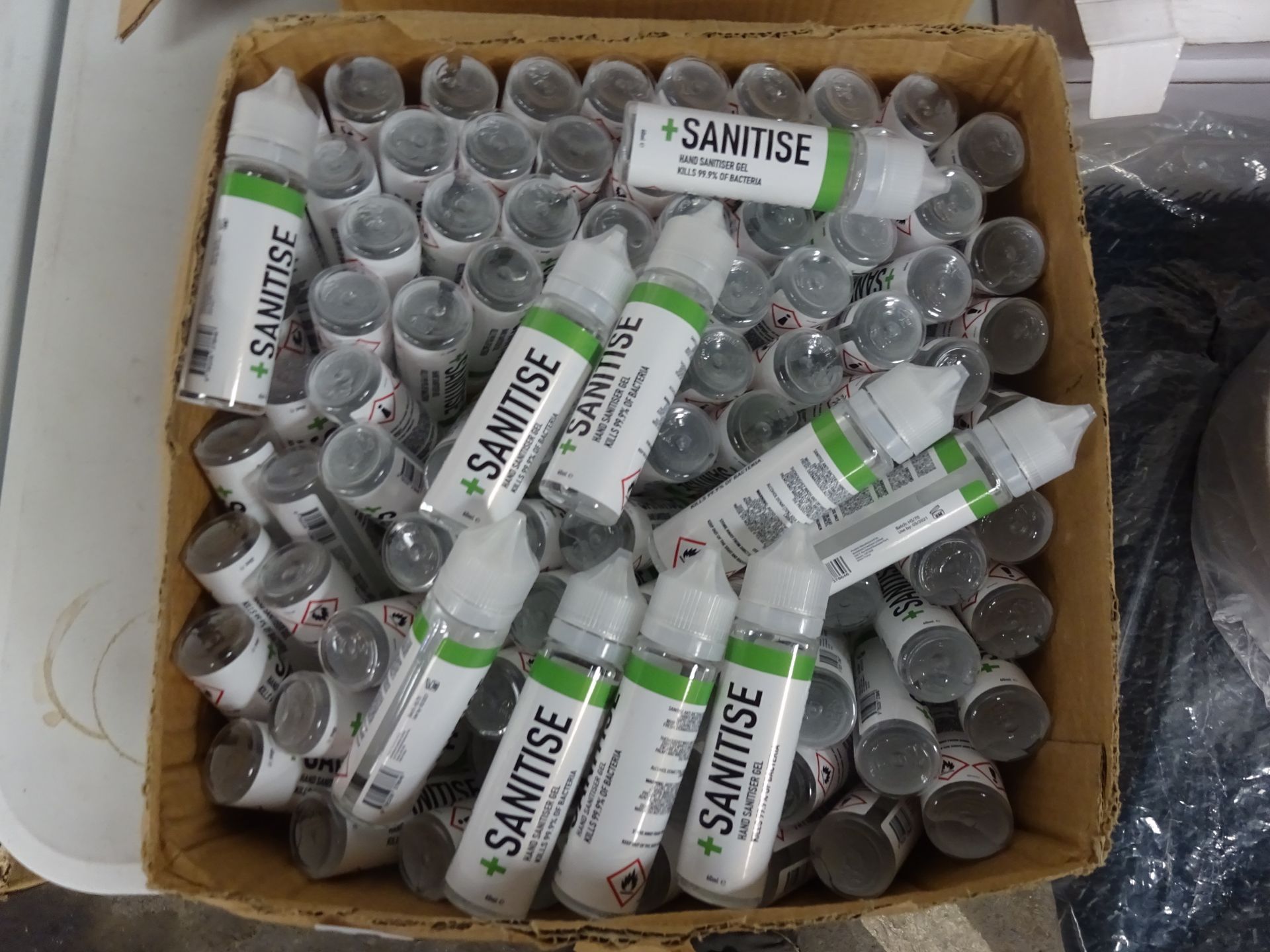 BOX OF APPROX 100 BOTTLES OF 60ML HAND SANITISER