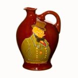 Rare Royal Doulton 'Micawber' whiskey flask in Kingsware glaze, hand painted detailing