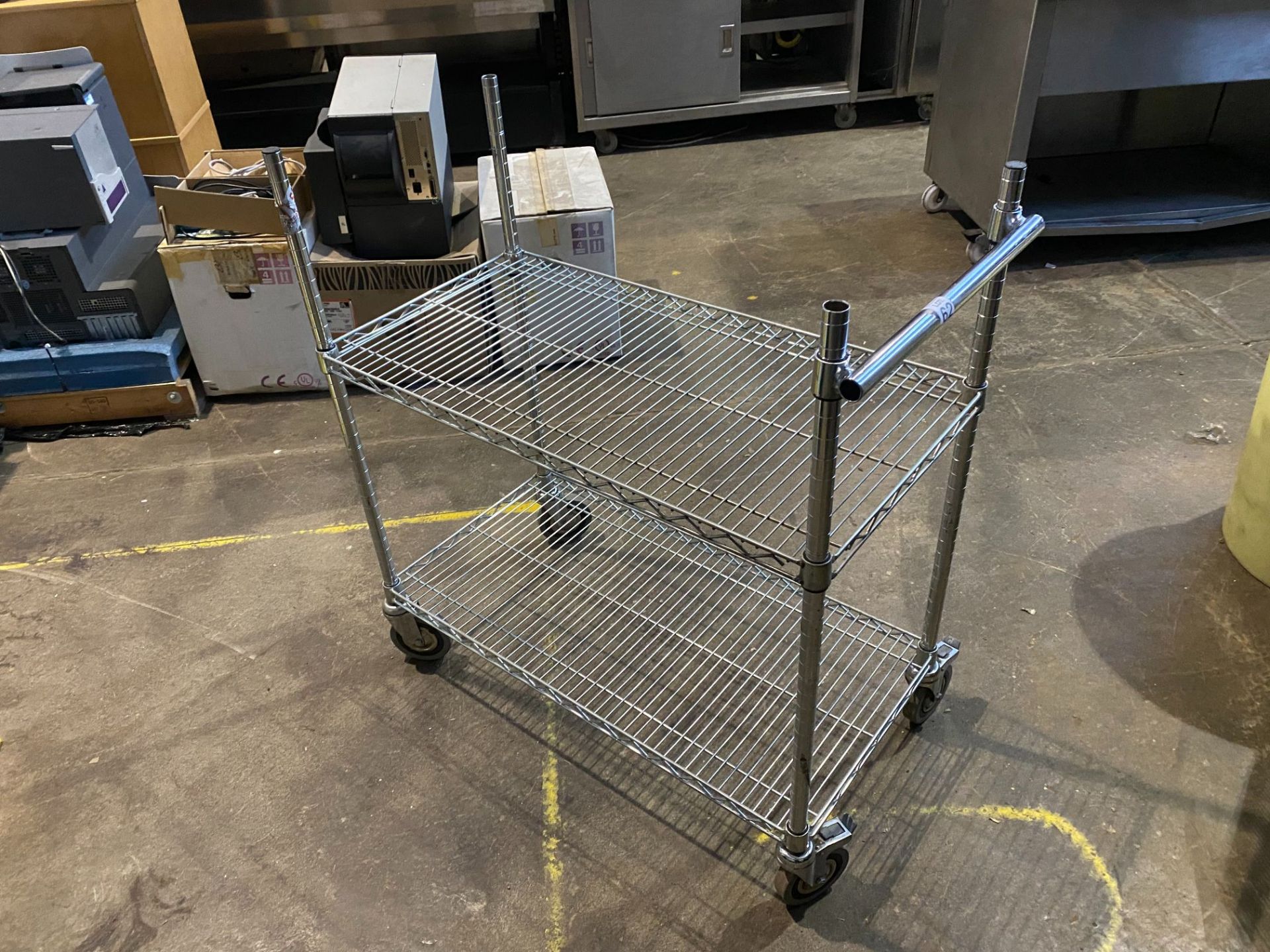 FOUR WHEELED STAINLESS STEEL KITCHEN TROLLEY