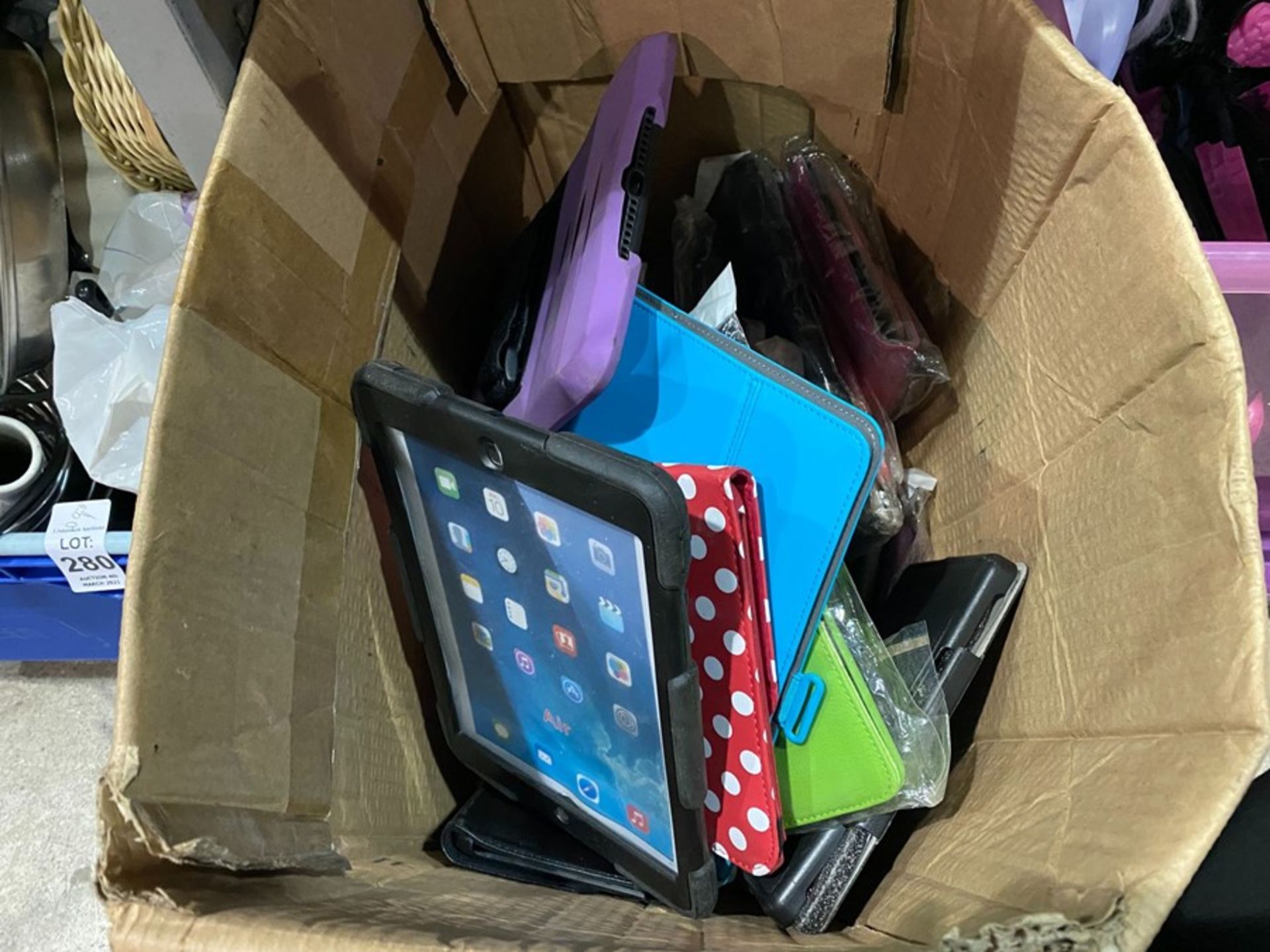 LARGE BOX OF IPAD COVERS ETC