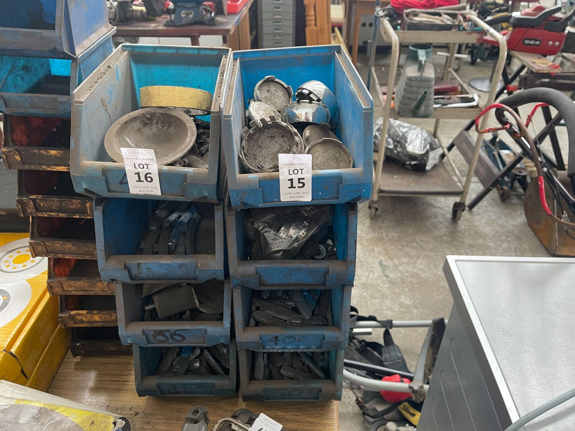 4X BLUE STORAGE TUBS WITH ASSORTED CONTENTS INC. WHEEL BALANCING WEIGHTS, NUTS/BOLTS ETC.