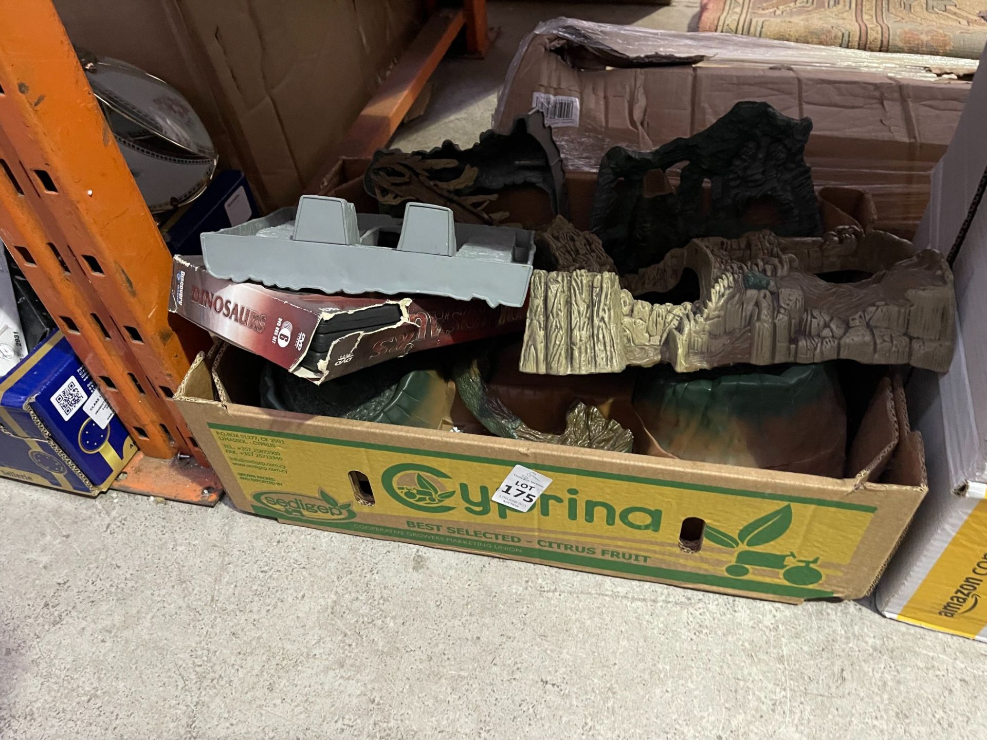 BOX OF DINOSAUR PLAY ITEMS