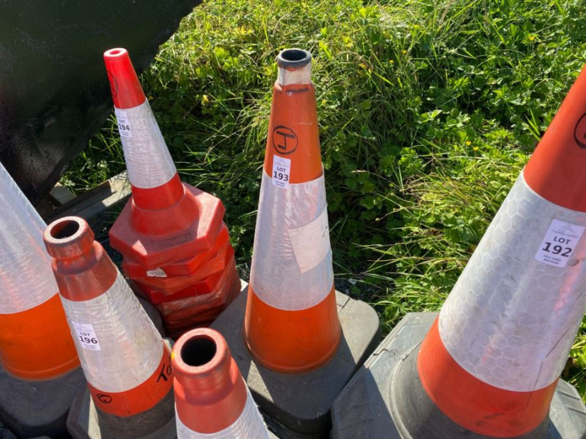 STACK OF TRAFFIC CONES (J) (HAMMER VAT ON THIS ITEM)