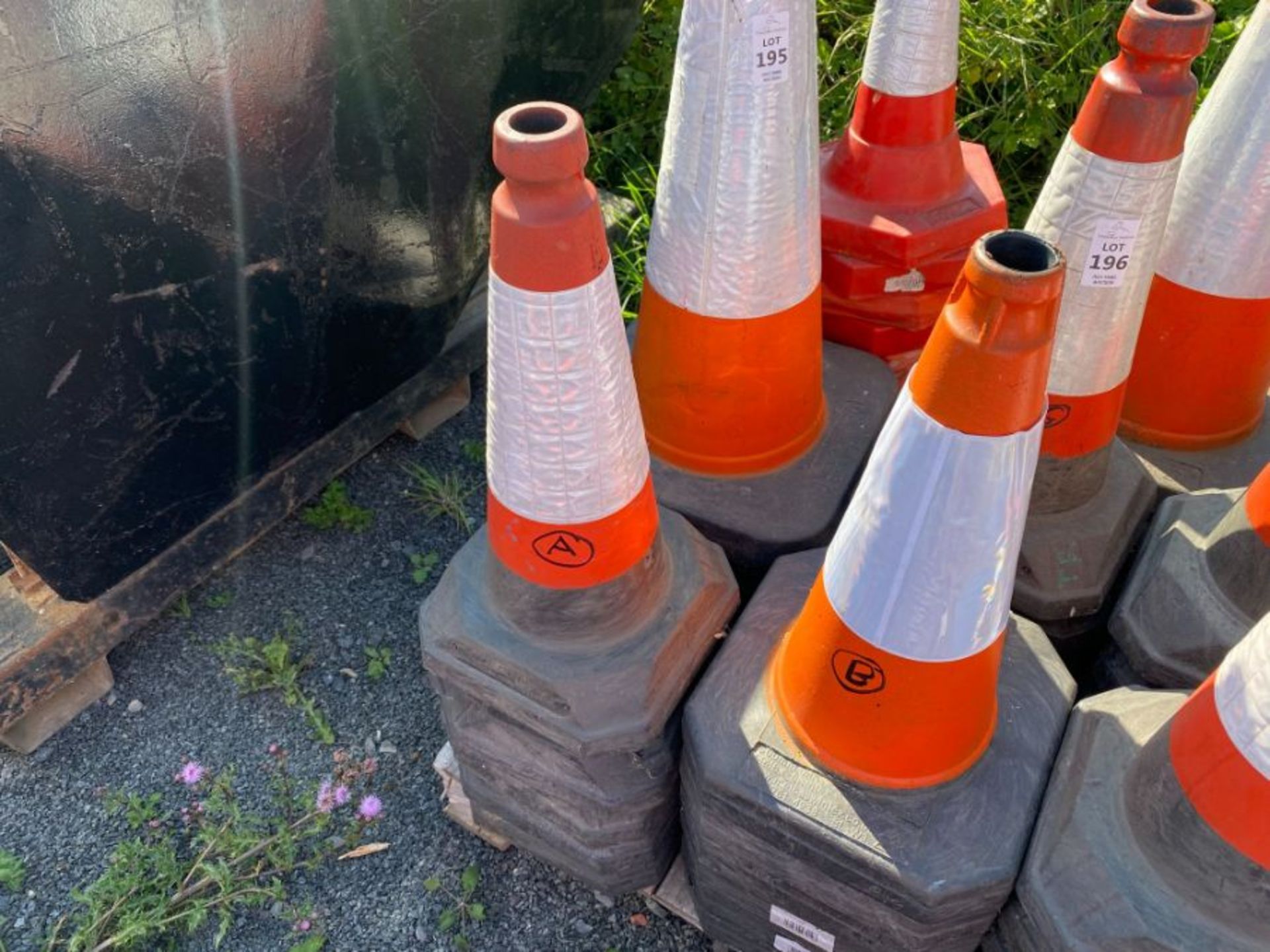 STACK OF TRAFFIC CONES (A) (HAMMER VAT ON THIS ITEM)