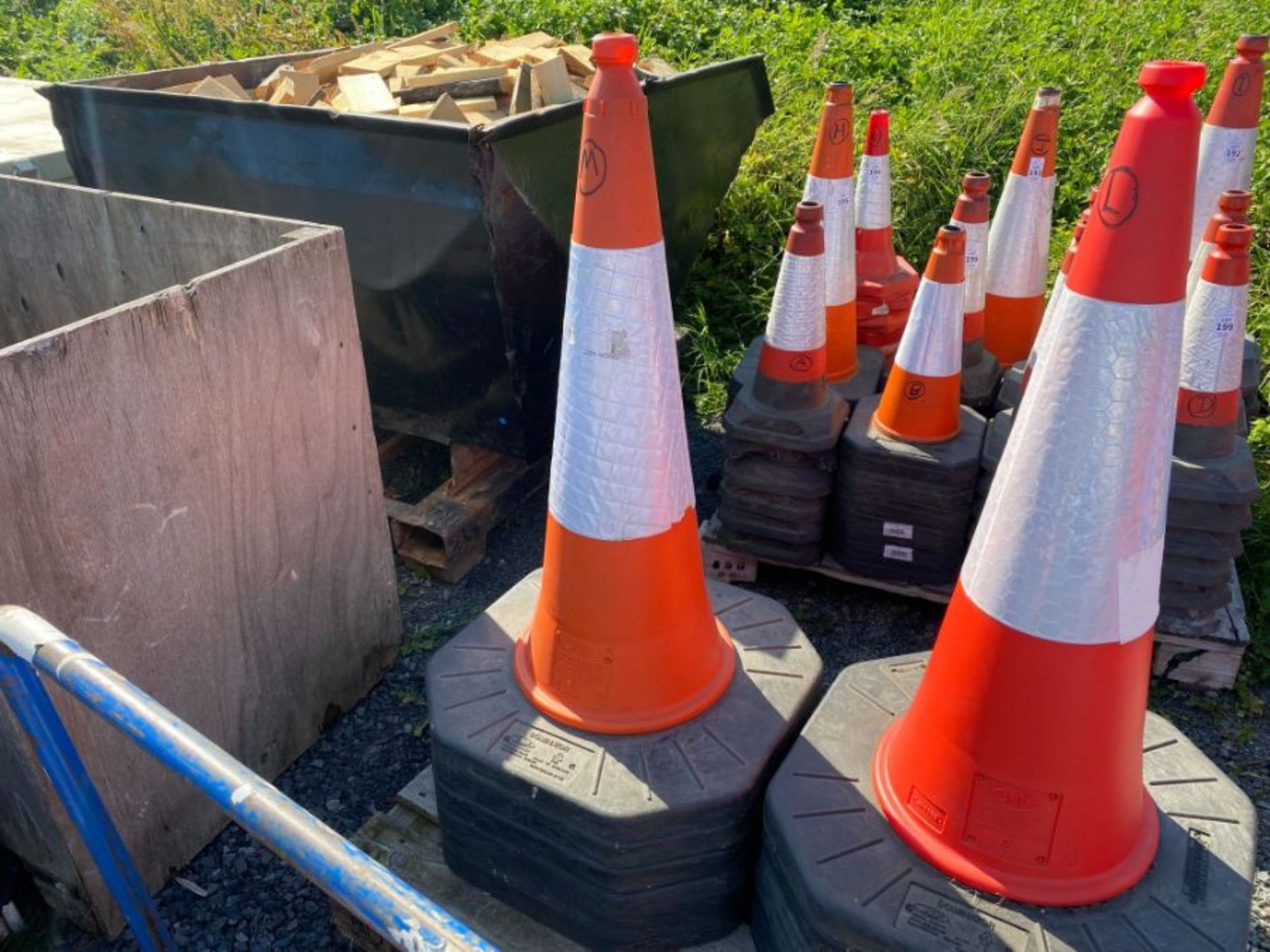 STACK OF TRAFFIC CONES (M) (HAMMER VAT ON THIS ITEM)