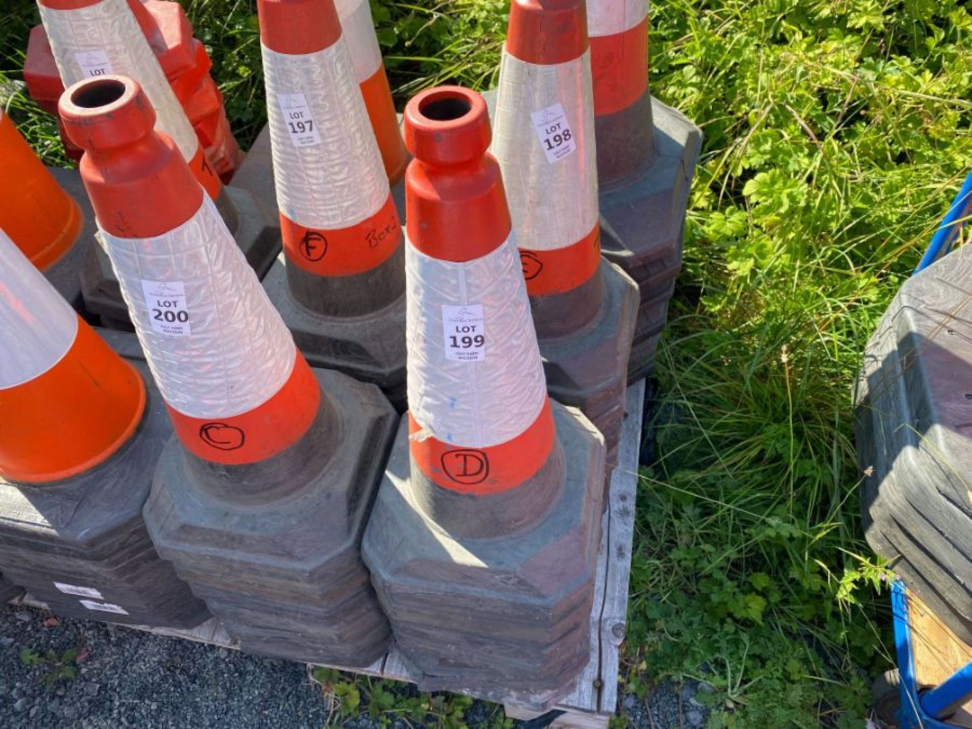 STACK OF TRAFFIC CONES (D) (HAMMER VAT ON THIS ITEM)