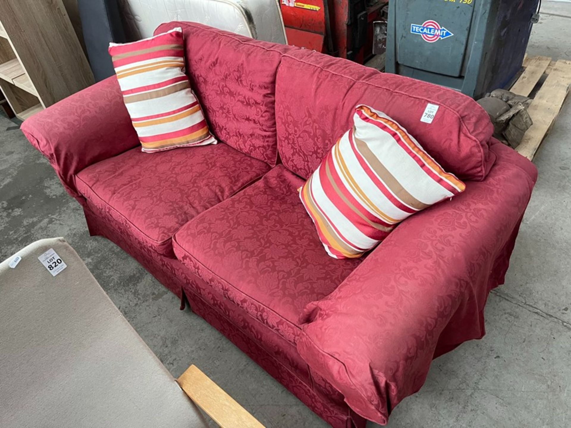 RED 2-SEATER SOFA WITH STRIPED CUSHIONS