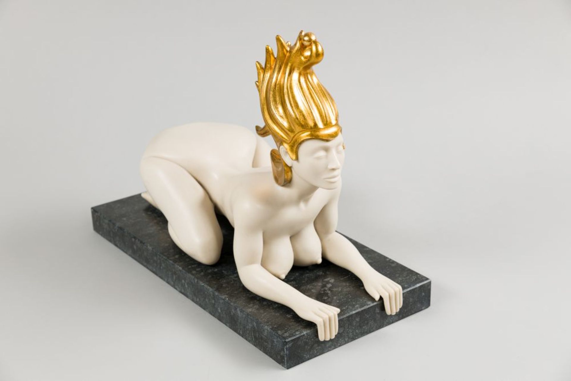 Viennese Sphinx Polymeric art casting, partly gilded on granite-pedestal Signed and numbered: 9/