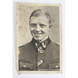 German SS Knights Cross winners postcard for SS Hauptsturmfuhrer Klingenberg, rather worn, an