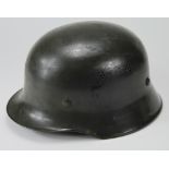 German Nazi Civil Defence green helmet with liner and chin strap, remains of one decal. Maker