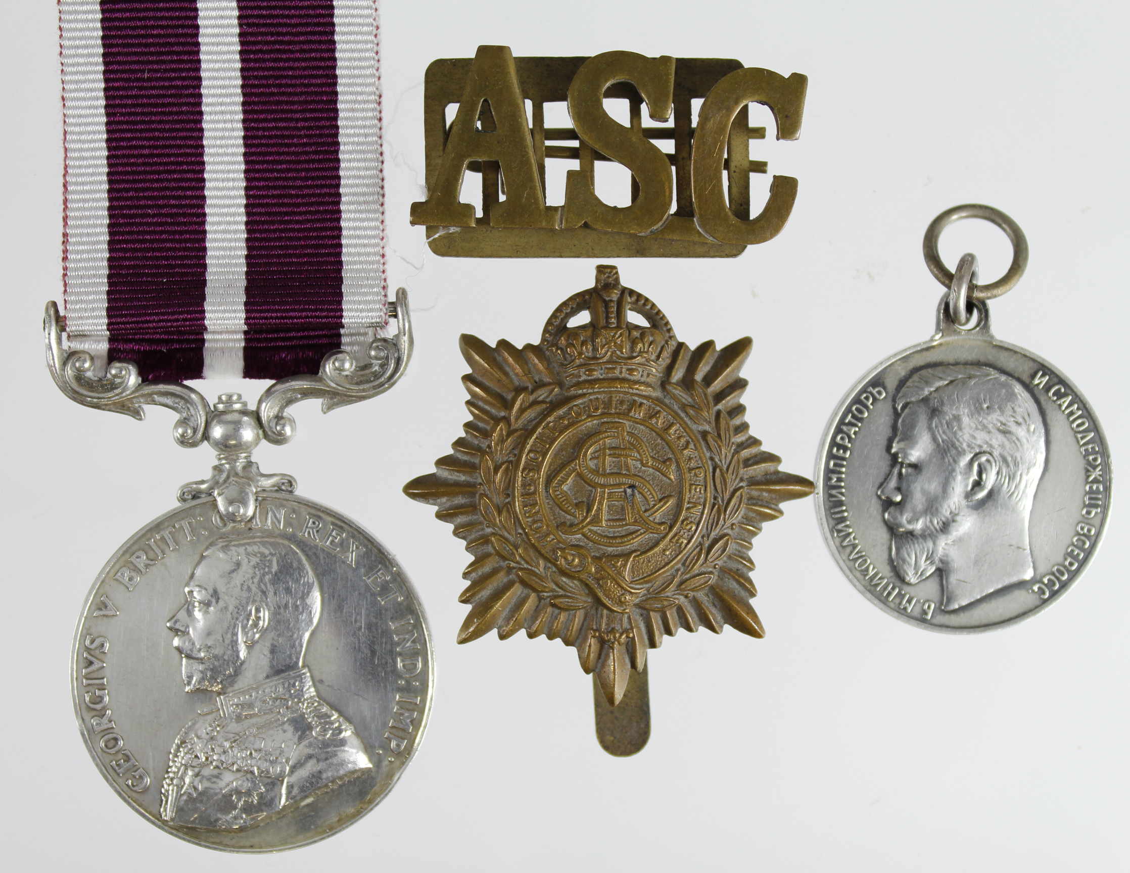 Meritorious Service Medal GV (swivel) named (M-401704 Pte-A.Cpl A Travis RASC). L/G for British