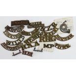 Badges (19) brass shoulder titles, includes Beds & Herts, Bedford, 3 Royal Marines etc.