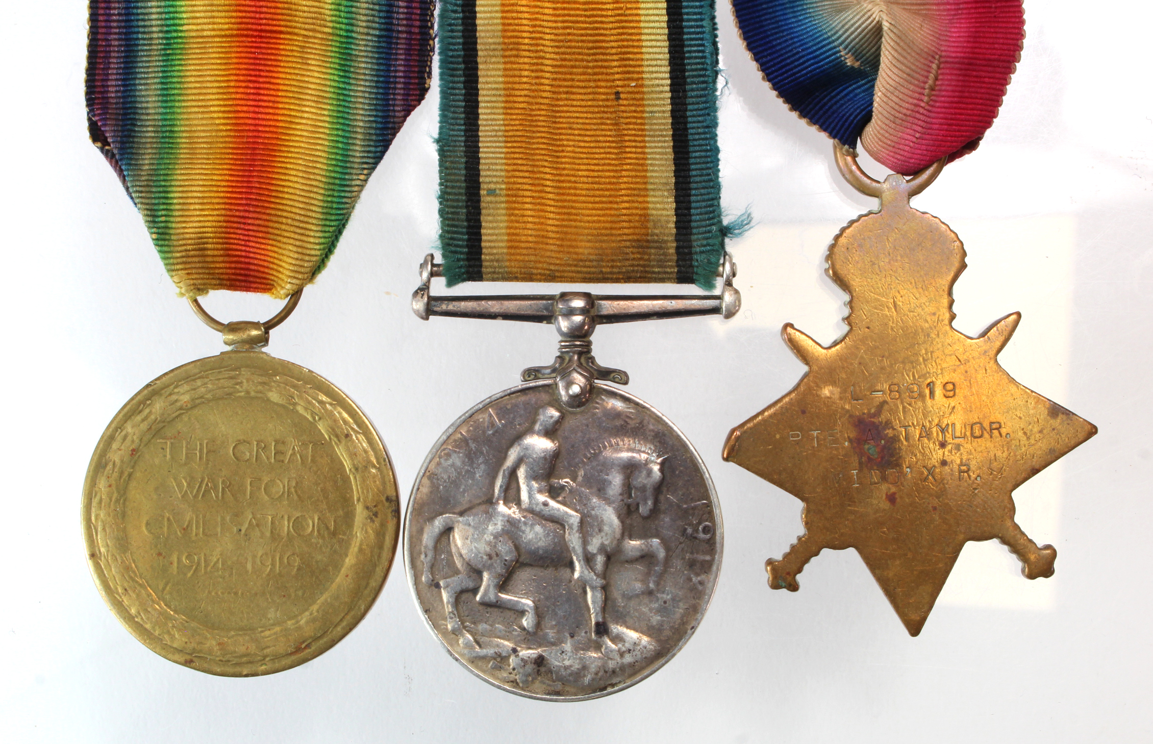 1915 Star Trio to L-8919 Pte A Taylor, Middlesex Regt. Medal mounted as worn and very polished. Sold - Image 2 of 2