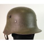 Imperial German Stalhelm steel helmet, apple green paint, complete with liner, ET maker marked.