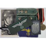 German WW2 badges epaulets medals etc.