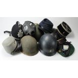 Helmets / Caps - very mixed collection inc USA, French, British 'C.W.D.' WW2 helmet, etc. (Qty)