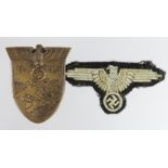 German Nazi SS Arm Eagle, woollen Other Ranks type. Plus a 1941 1942 Krim Shield. (2)