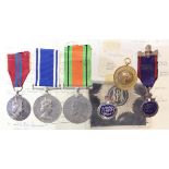 Metropolitan Police group to Constable William E H Mills. Defence Medal, 1953 Coronation Medal,