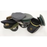 Military hats / caps inc British, German, etc, including replicas. (10)