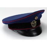 German Nazi blue cloth Postal Service peaked cap with red piping and cap badge