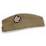 British soldiers sidecap with attached SAS cloth badge, maker marked and 1940 dated
