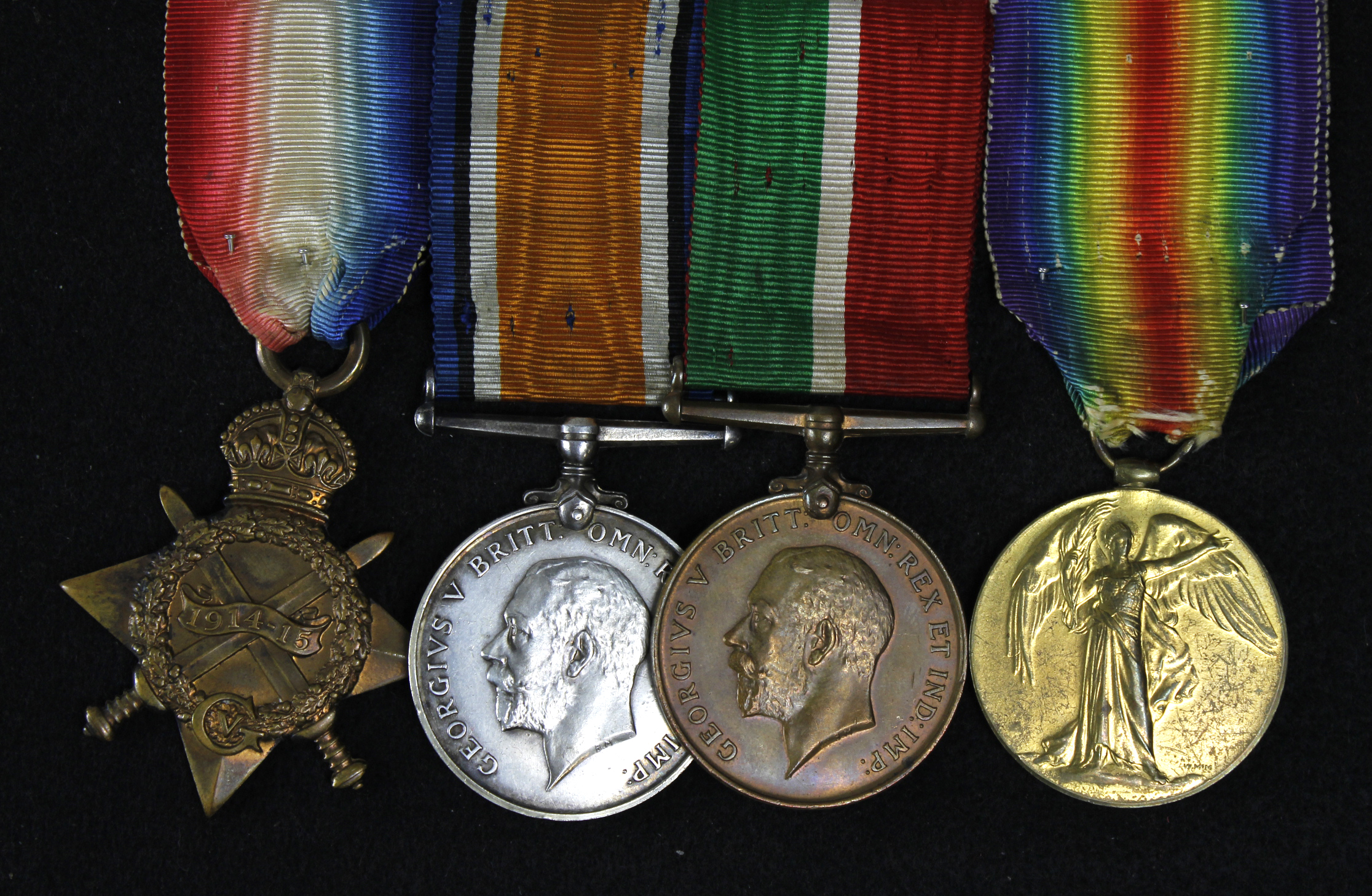 1915 Star Trio (D-1369 A H Dufty SMN RNR) (spelt Duffy on the BWM) and Mercantile Marine Medal (