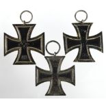 German WW1 Iron Cross 2nd Class x2, one maker marked 'KO'. Plus a Nazi Iron Cross 2nd Class. No