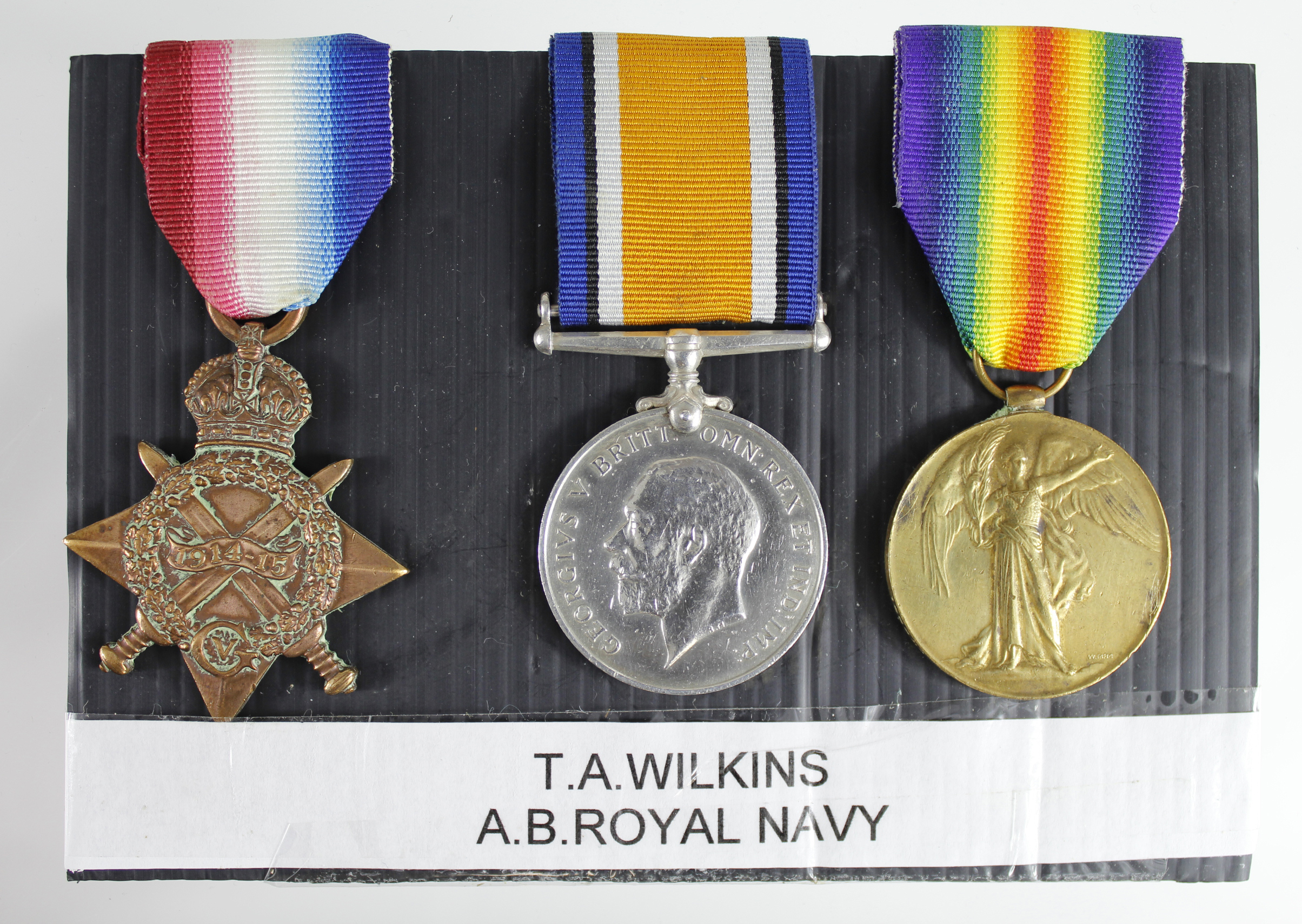 1915 Star Trio to 166354 T A Wilkins AB RN. Born Southsea, Hants. (3)