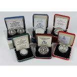 GB Silver Proof boxed issues (9) Crowns 1981, 90, 93, 96, 97 & 1999. Ten Pence 1992 two-coin set,